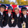 Great Britain’s four-rider eventing team celebrating together after winning the inaugural FEI Eventing Nations Cup Final at Boekelo.